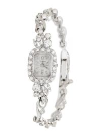 BULOVA, 14K WHITE GOLD AND DIAMOND WATCH