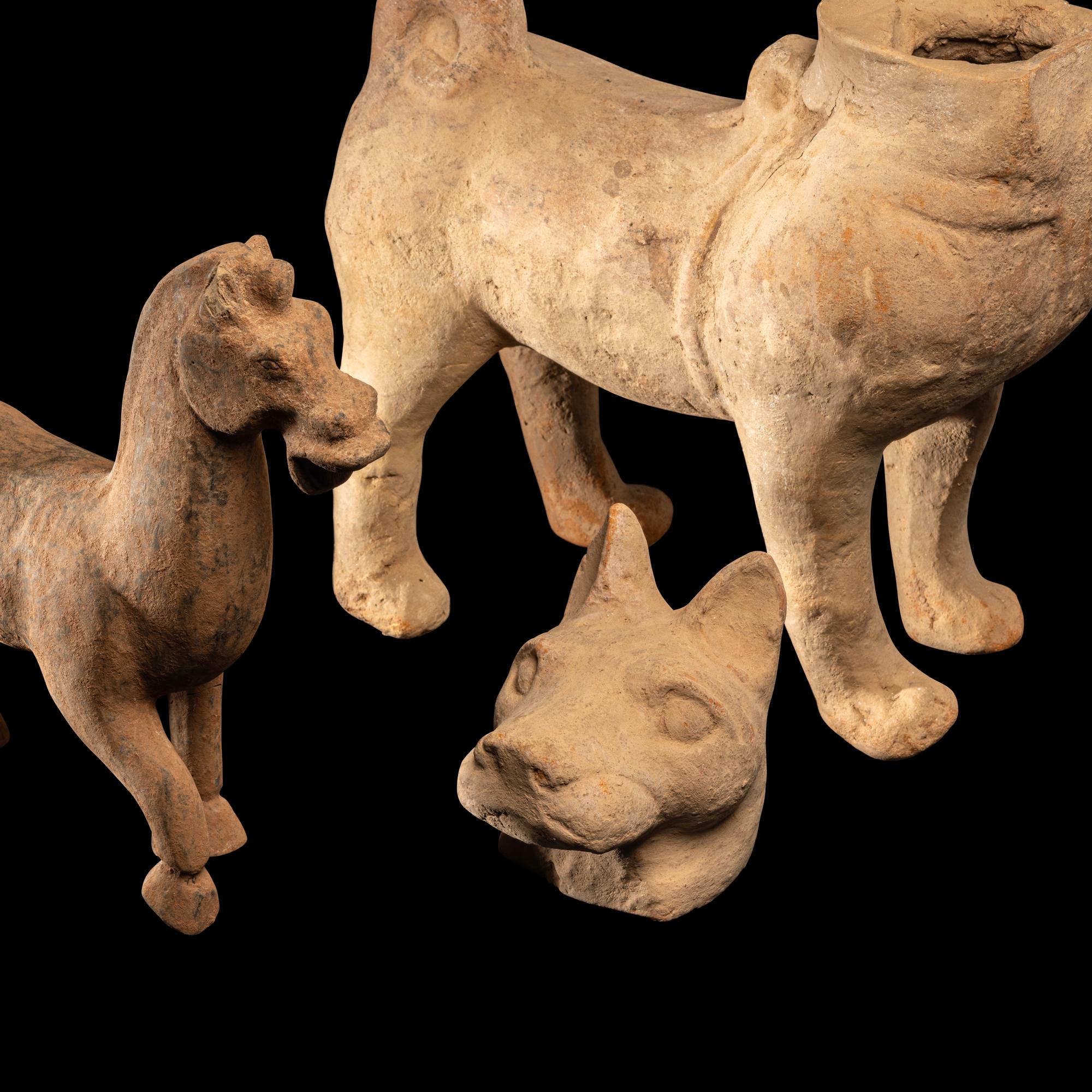 A Chinese Pottery Dog and A Horse