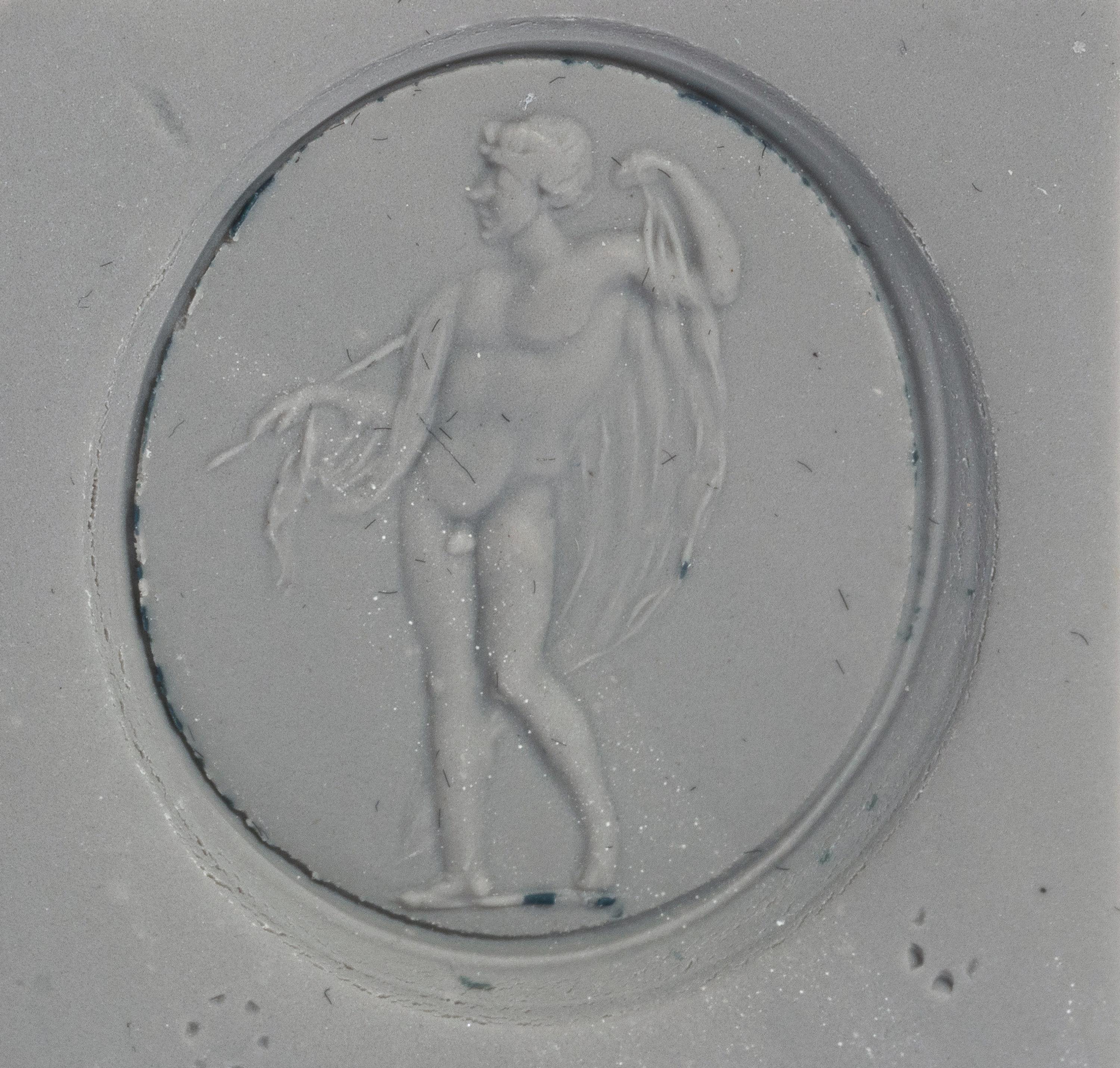 A Neoclassical Gold and Chalcedony Pendant with a Standing Male Figure