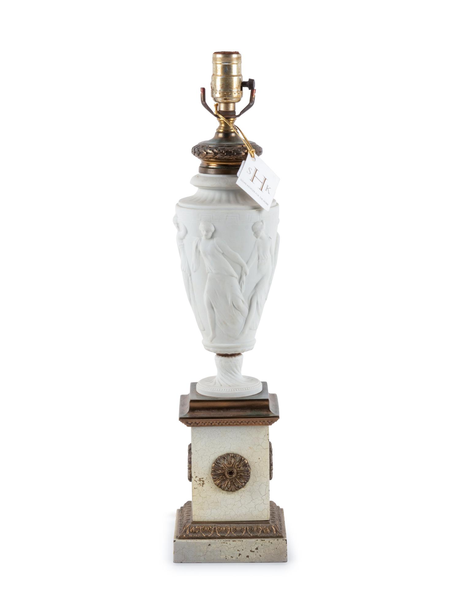 A Neoclassical Bisque Porcelain and Gilt Metal Mounted Table Lamp