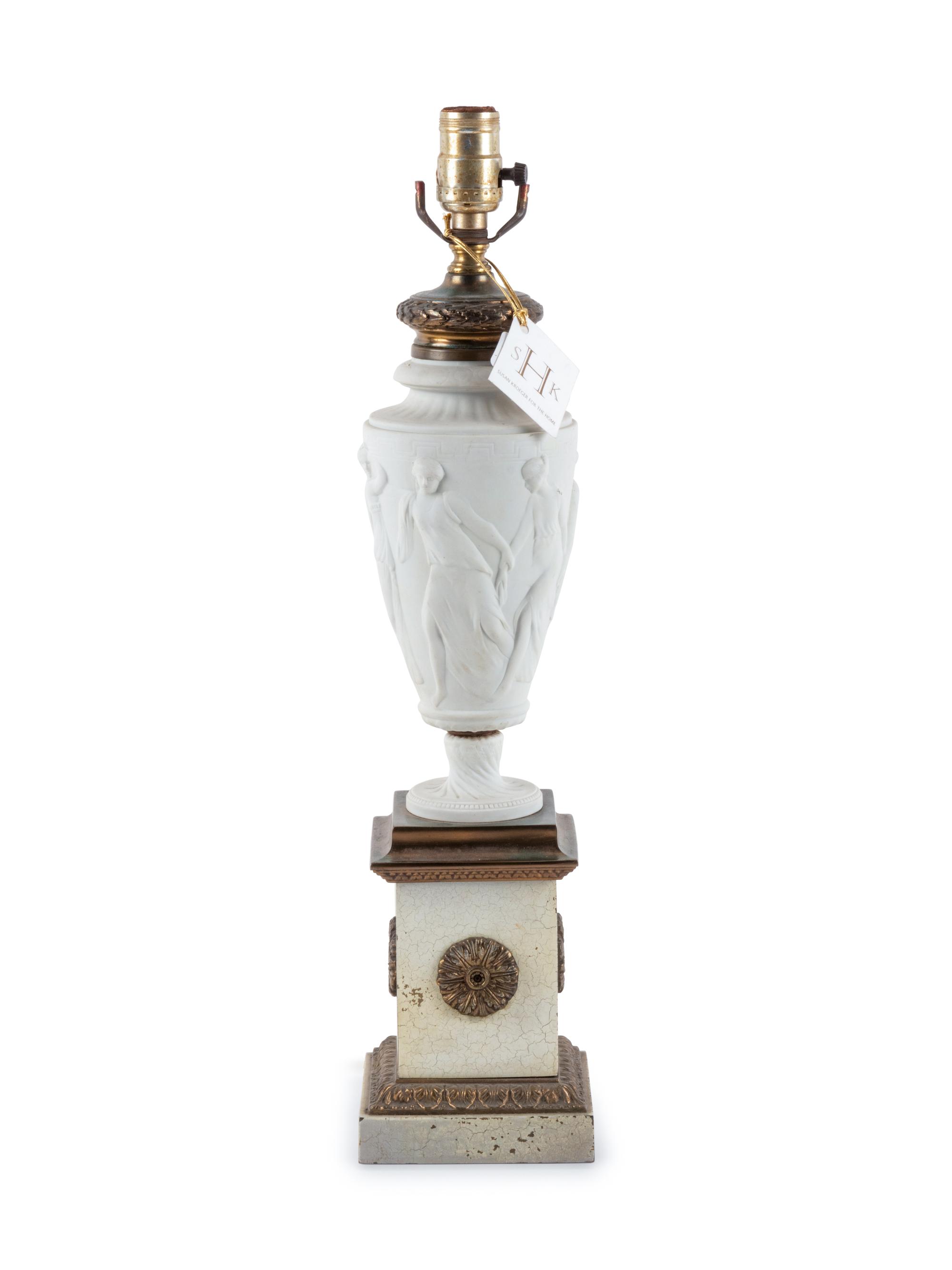 A Neoclassical Bisque Porcelain and Gilt Metal Mounted Table Lamp