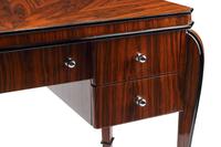An Art Deco Style Part-Ebonized Rosewood Writing Table