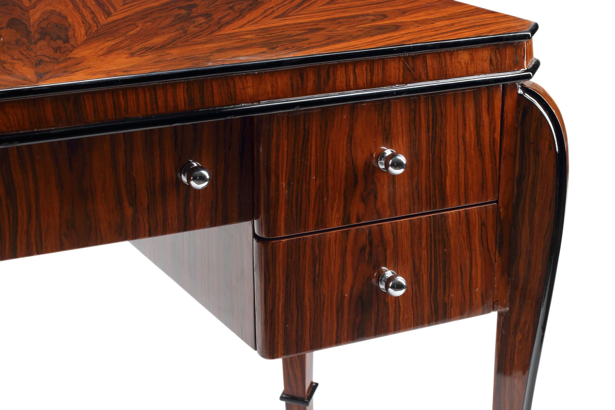 An Art Deco Style Part-Ebonized Rosewood Writing Table