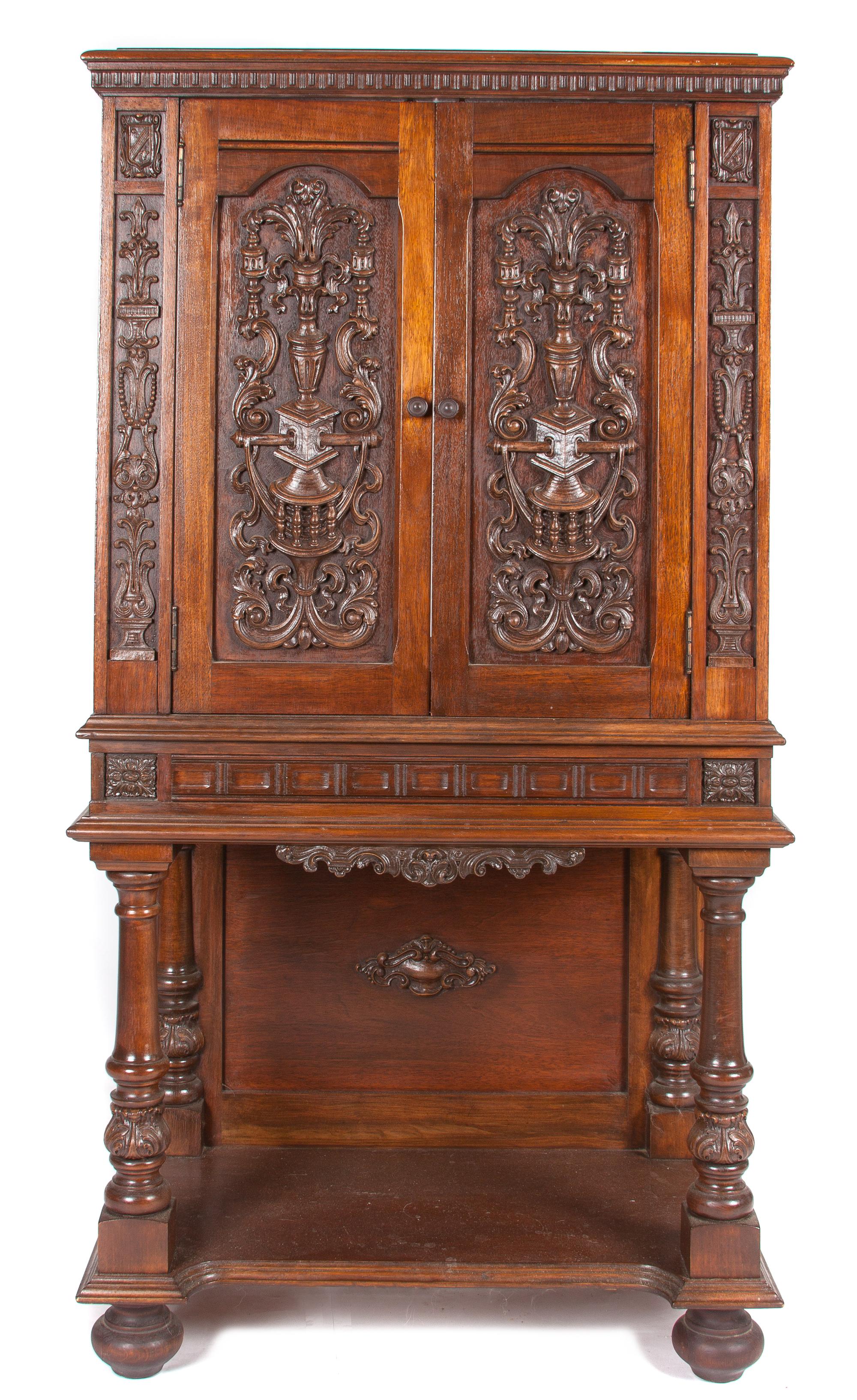 A Continental Mahogany Court Cupboard Height 53 x width 27 1/2 x depth 16 1/4 inches. — FIRST HALF 20TH CENTURY