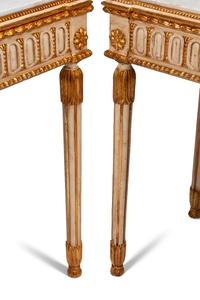 A Pair of Italian Neoclassical Style Cream-Painted, Parcel Gilt and Micro Mosaic Plaque-Mounted Console Tables