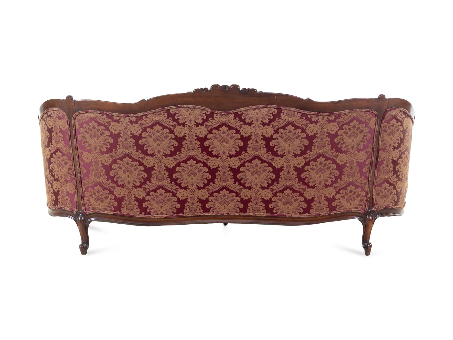 A Rococo Revival Carved Walnut Sofa