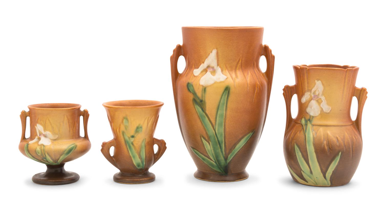 Four Roseville Iris Pottery Vases Height of tallest 8 1/2 inches.