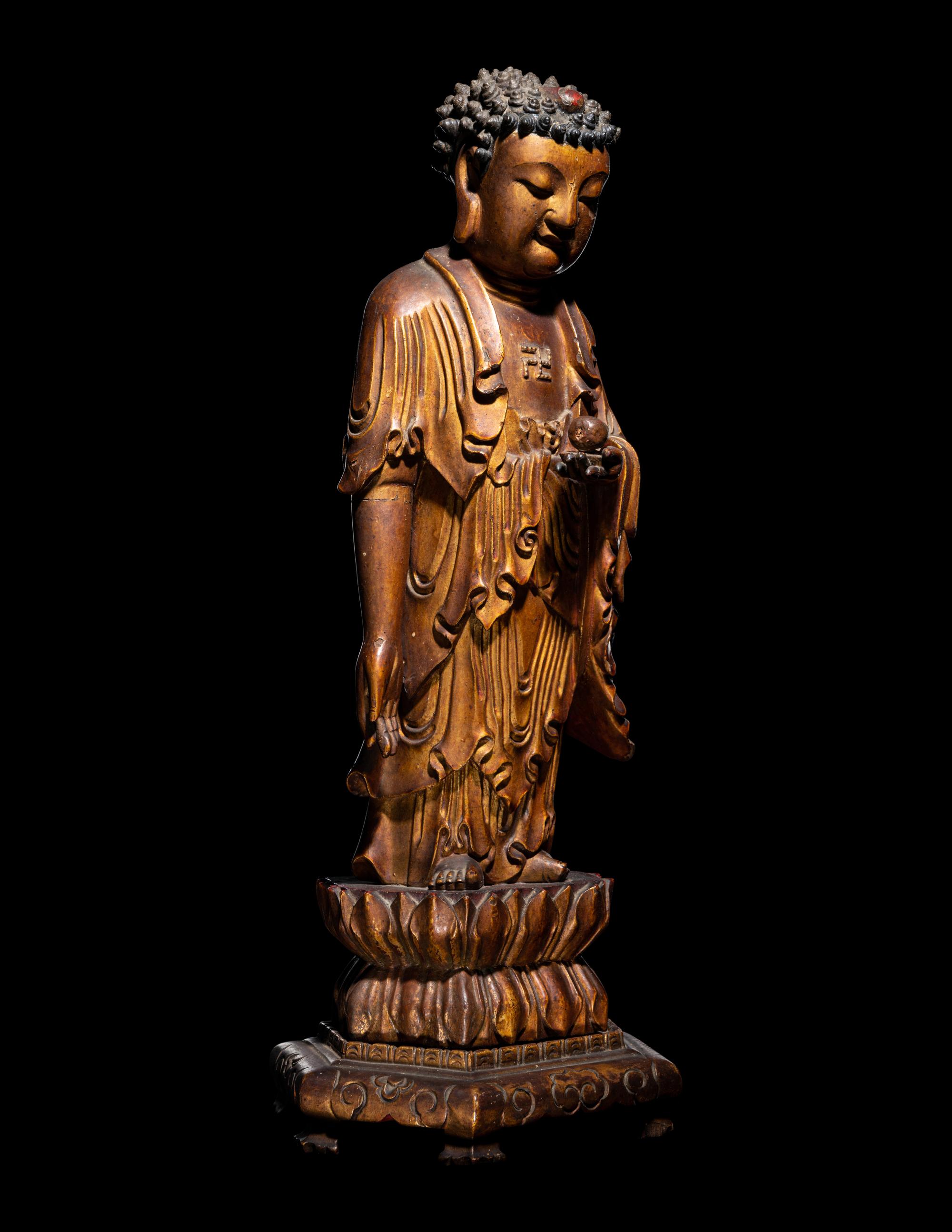 A Gilt Lacquered Wood Figure of Buddha Shakyamuni