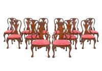 A Set of Twelve Baker George II Style Dining Chairs