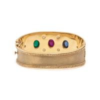 BRUSHED YELLOW GOLD, RUBY, EMERALD, SAPPHIRE, AND DIAMOND BANGLE BRACELET