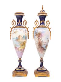 A Pair of Sèvres Style Gilt Metal Mounted Porcelain Urns