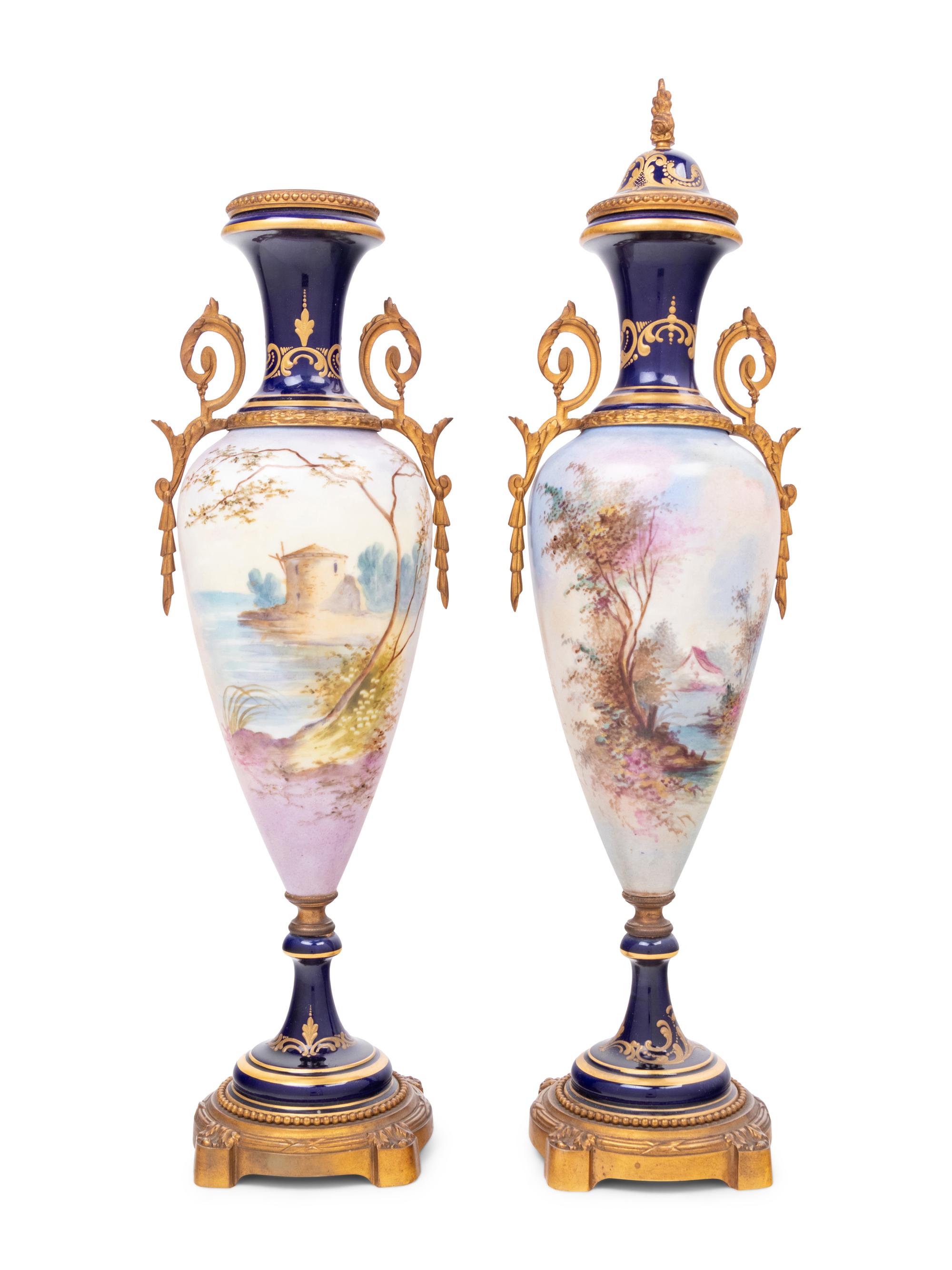 A Pair of Sèvres Style Gilt Metal Mounted Porcelain Urns
