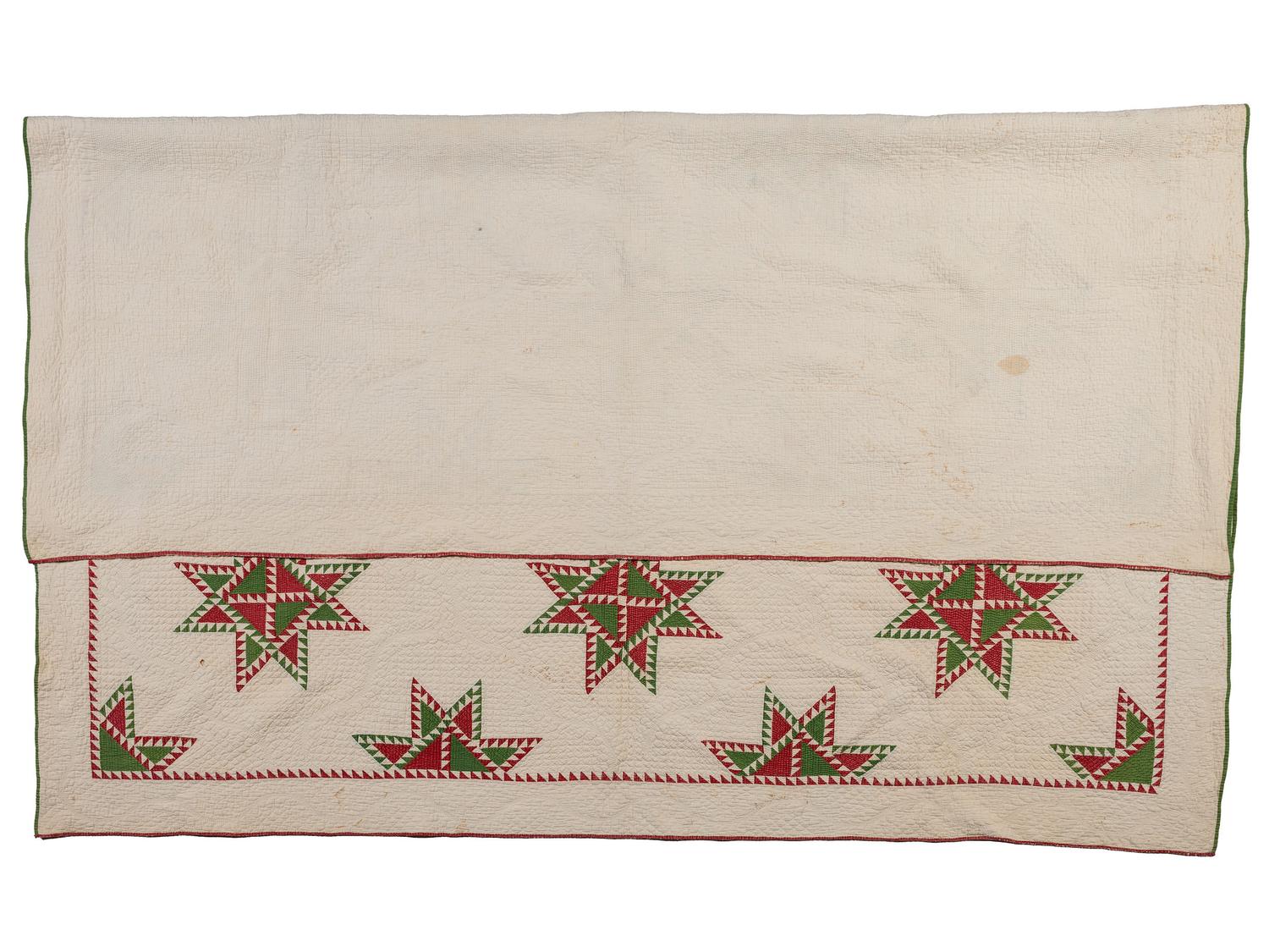 A Hand-Sewn Red and Green "Star" Pattern Quilt