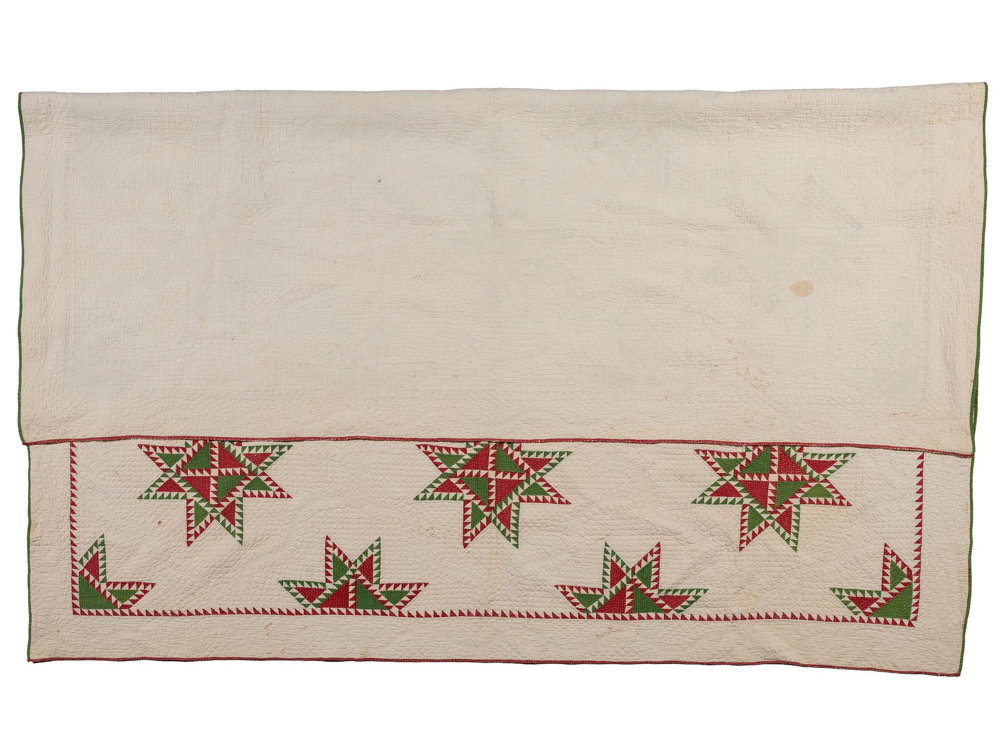 A Hand-Sewn Red and Green "Star" Pattern Quilt