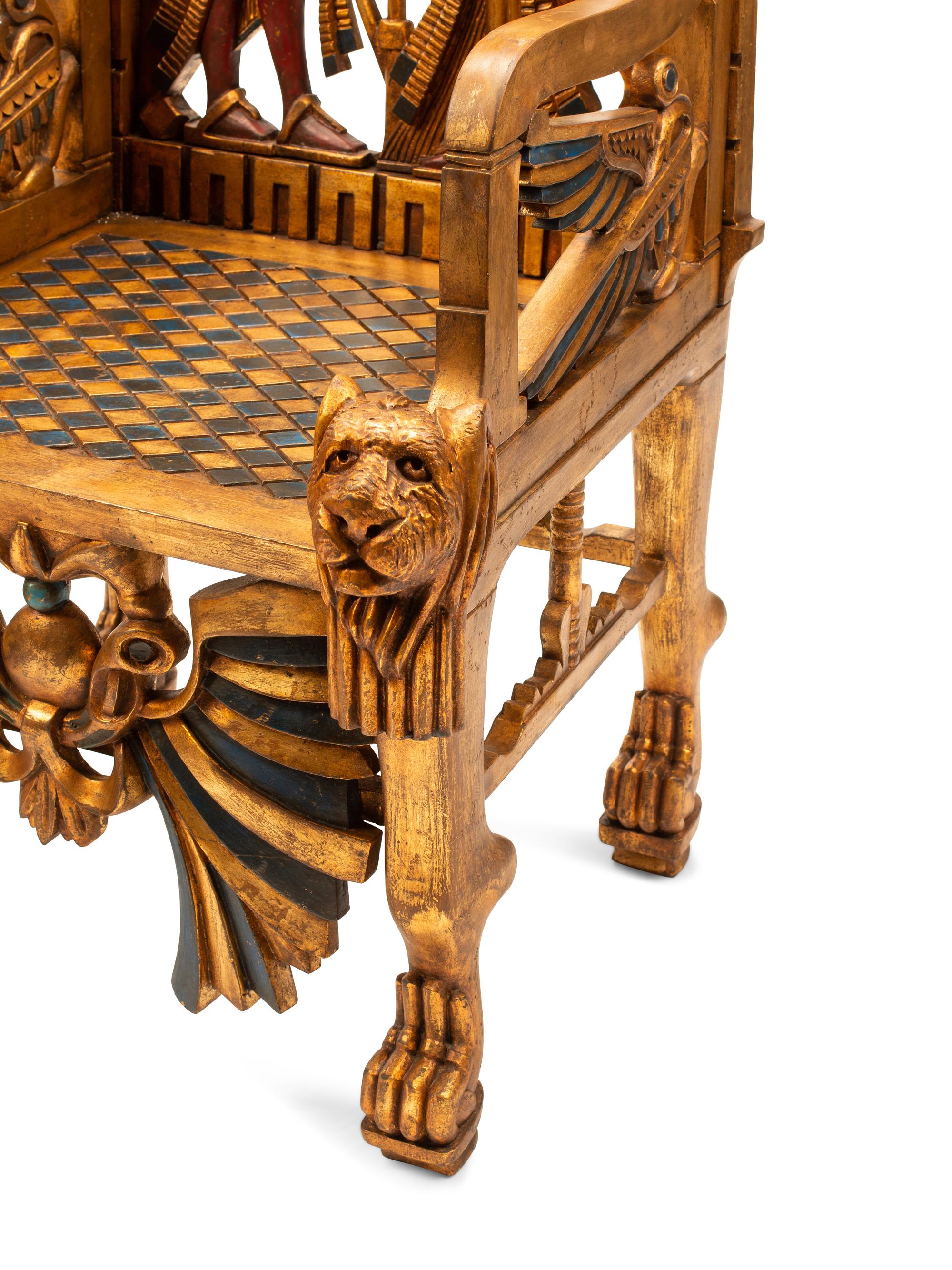 A Pair of Egyptianesque Painted and Giltwood Throne Chairs