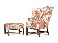 An English Mahogany Wingback Chair and Ottoman