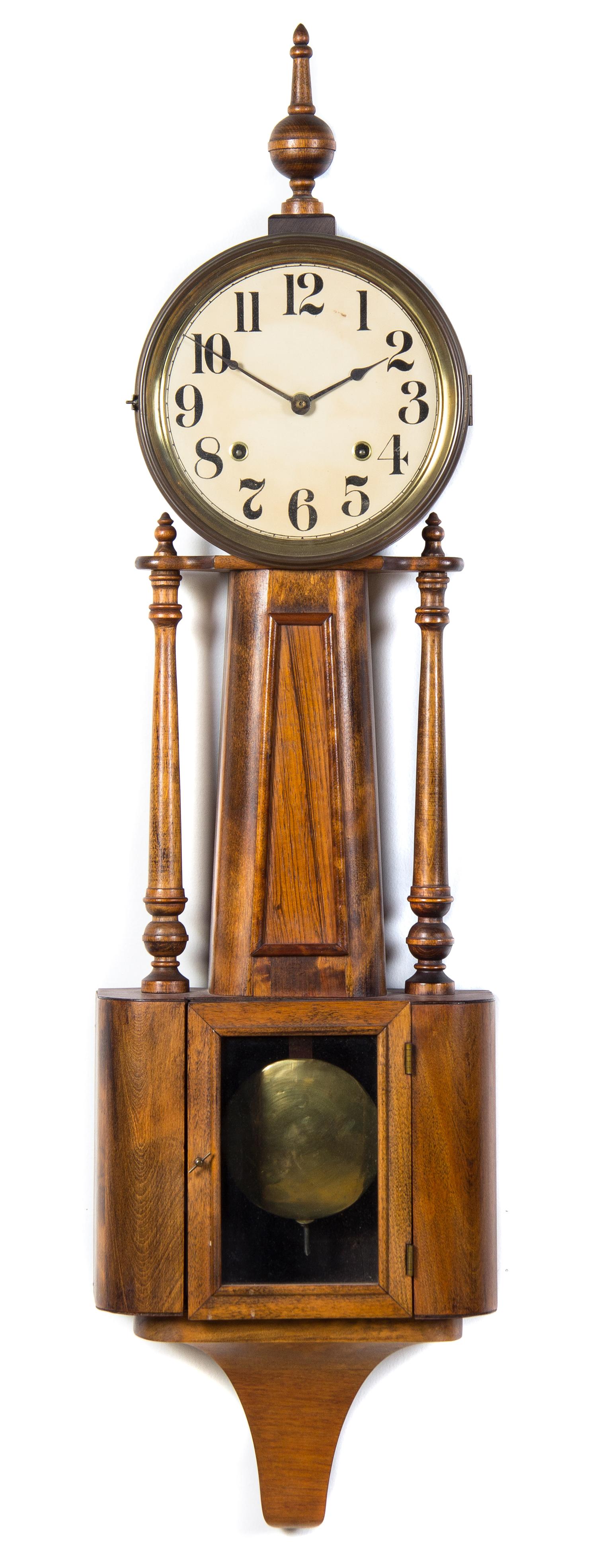 An American Oak Banjo Clock Length of case 39 inches. — THE E. INGRAHAM COMPANY, BRISTOL, CT