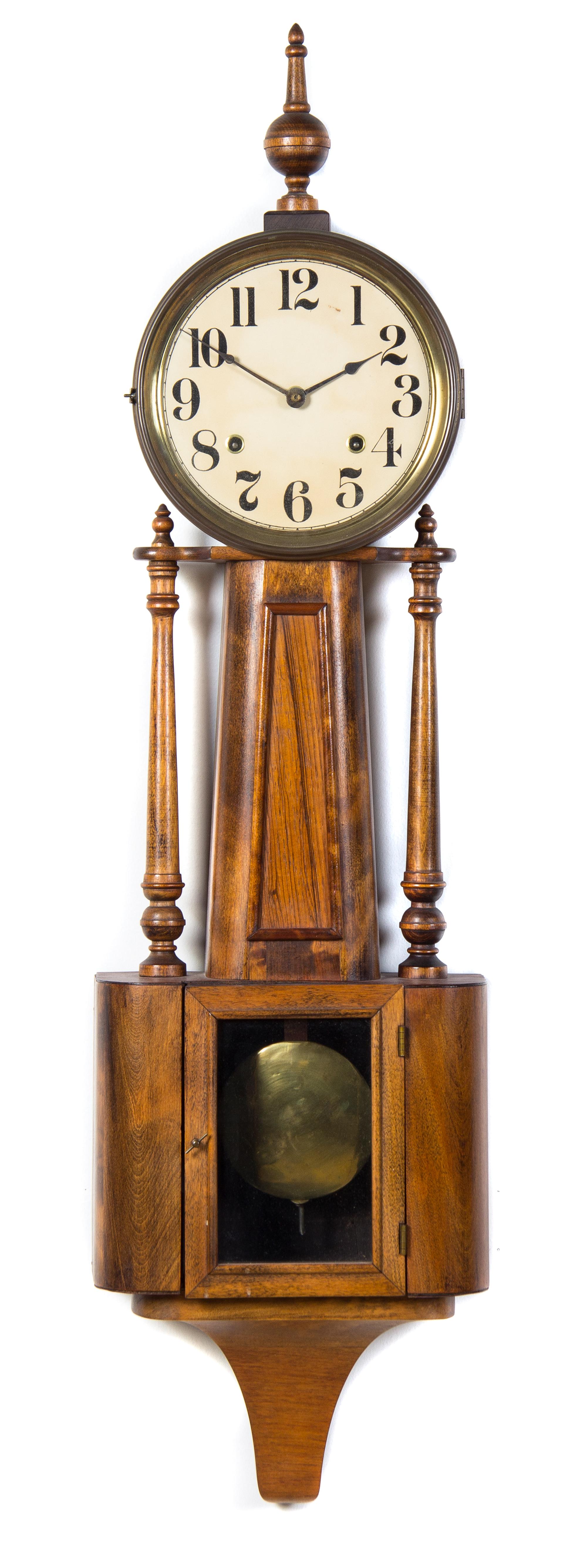 An American Oak Banjo Clock Length of case 39 inches. — THE E. INGRAHAM COMPANY, BRISTOL, CT