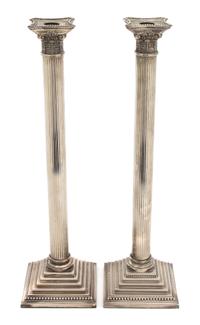 A Pair of Silver Plate Tall Columnar Candlesticks — 20TH CENTURY