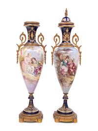 A Pair of Sèvres Style Gilt Metal Mounted Porcelain Urns