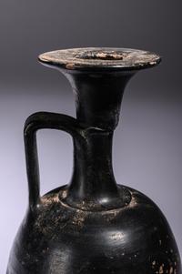 A Greek Black Glazed Lekythos