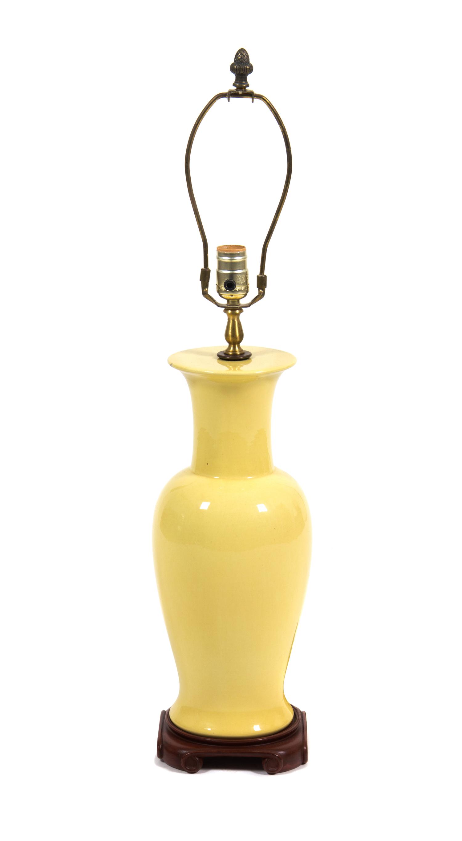 A Yellow Glazed Ceramic Vase Height 30 inches.
