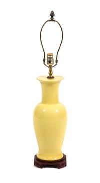 A Yellow Glazed Ceramic Vase Height 30 inches.