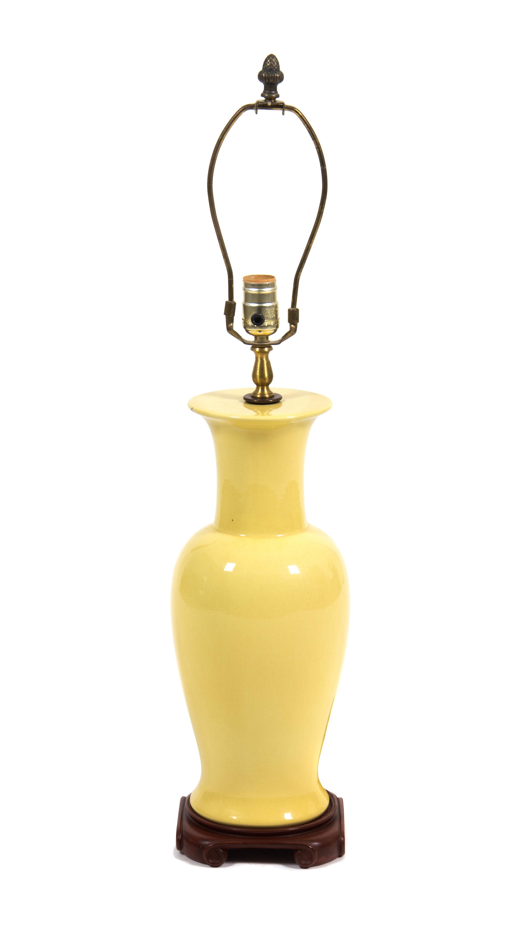 A Yellow Glazed Ceramic Vase Height 30 inches.