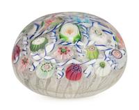 A Clichy Barber Pole and Rose Cane Glass Paperweight