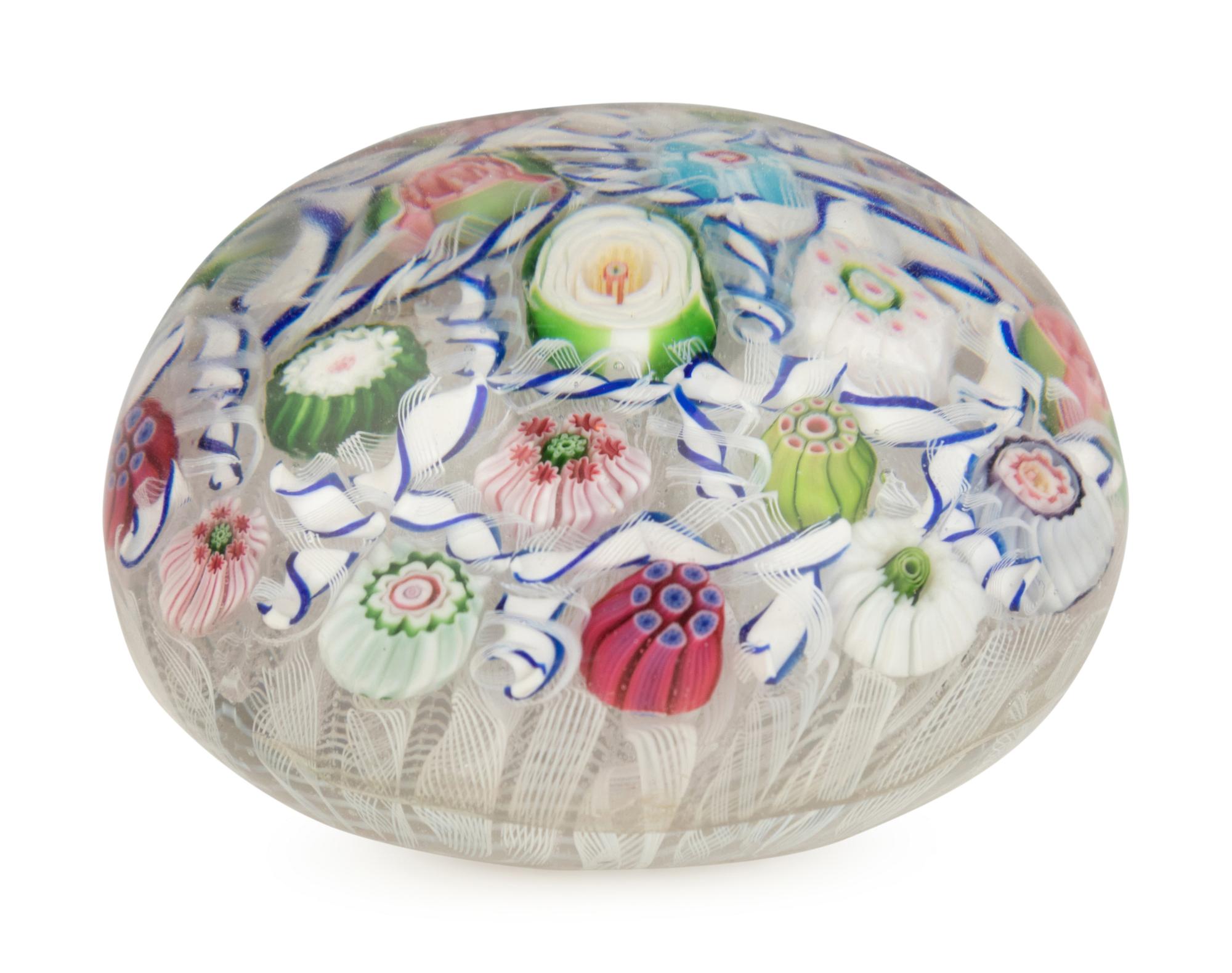 A Clichy Barber Pole and Rose Cane Glass Paperweight