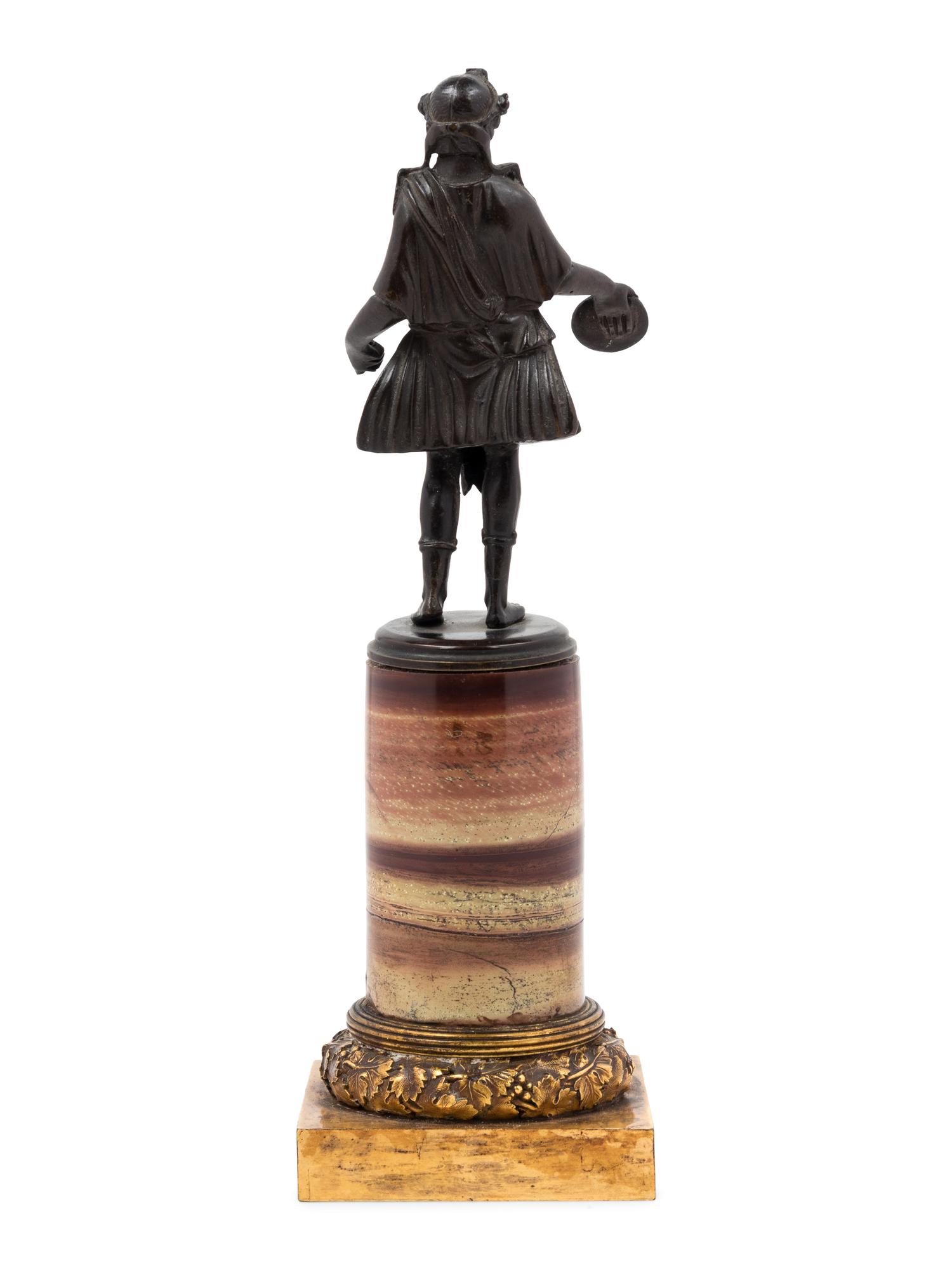 A Grand Tour Bronze Figure on a Marble Base