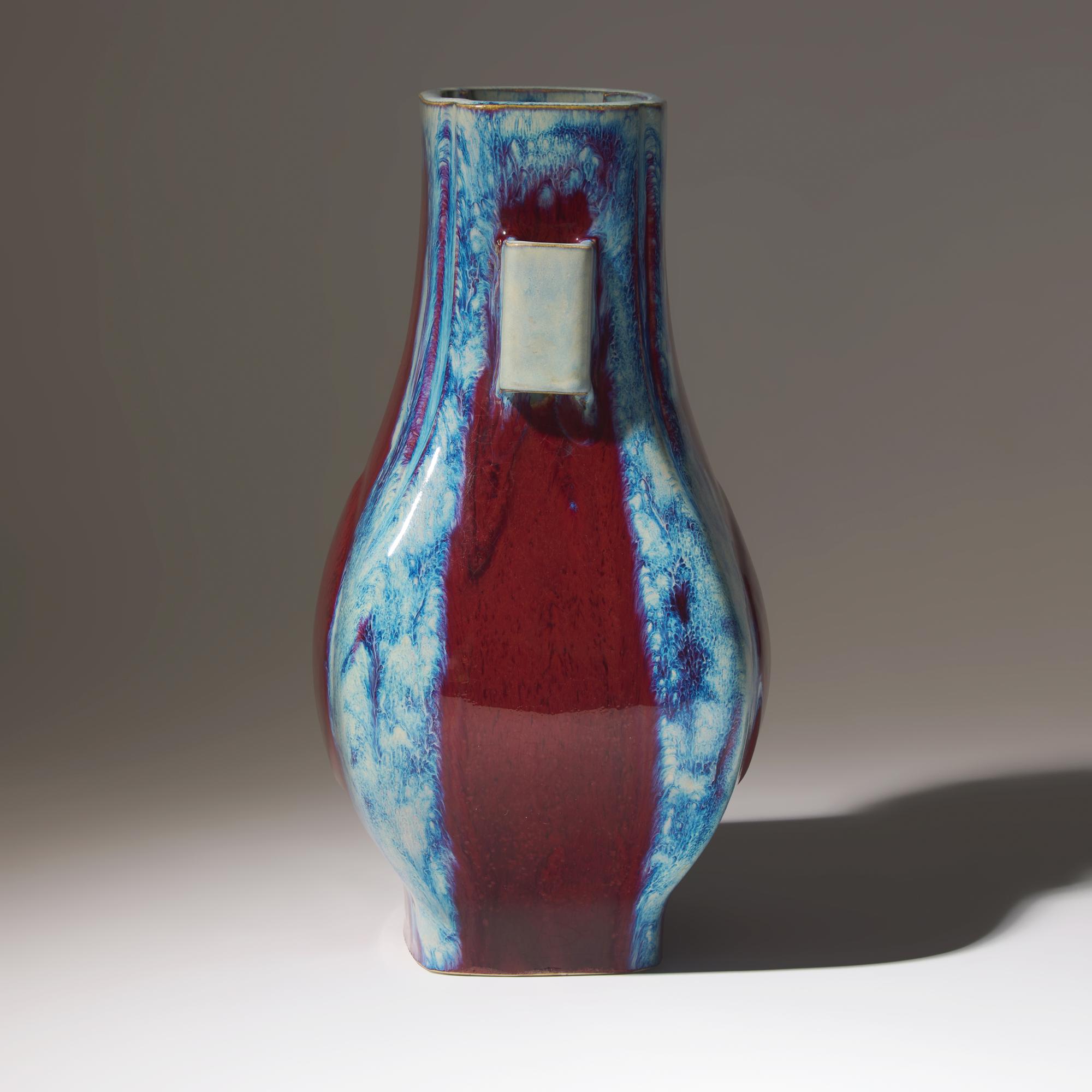 A Chinese Flambe-Glazed Vase Fanghu, Qianlong Mark and of the Period — 清乾隆 窯變釉杏圓貫耳方瓶