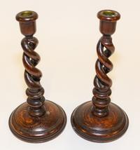 A Pair of English Oak Candlesticks Height 10 1/4 inches. — 19TH CENTURY