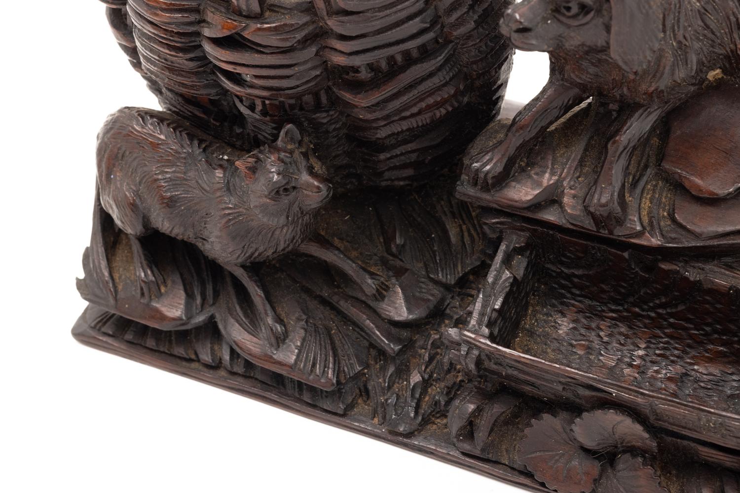 A Black Forest Carved Cigar Humidor