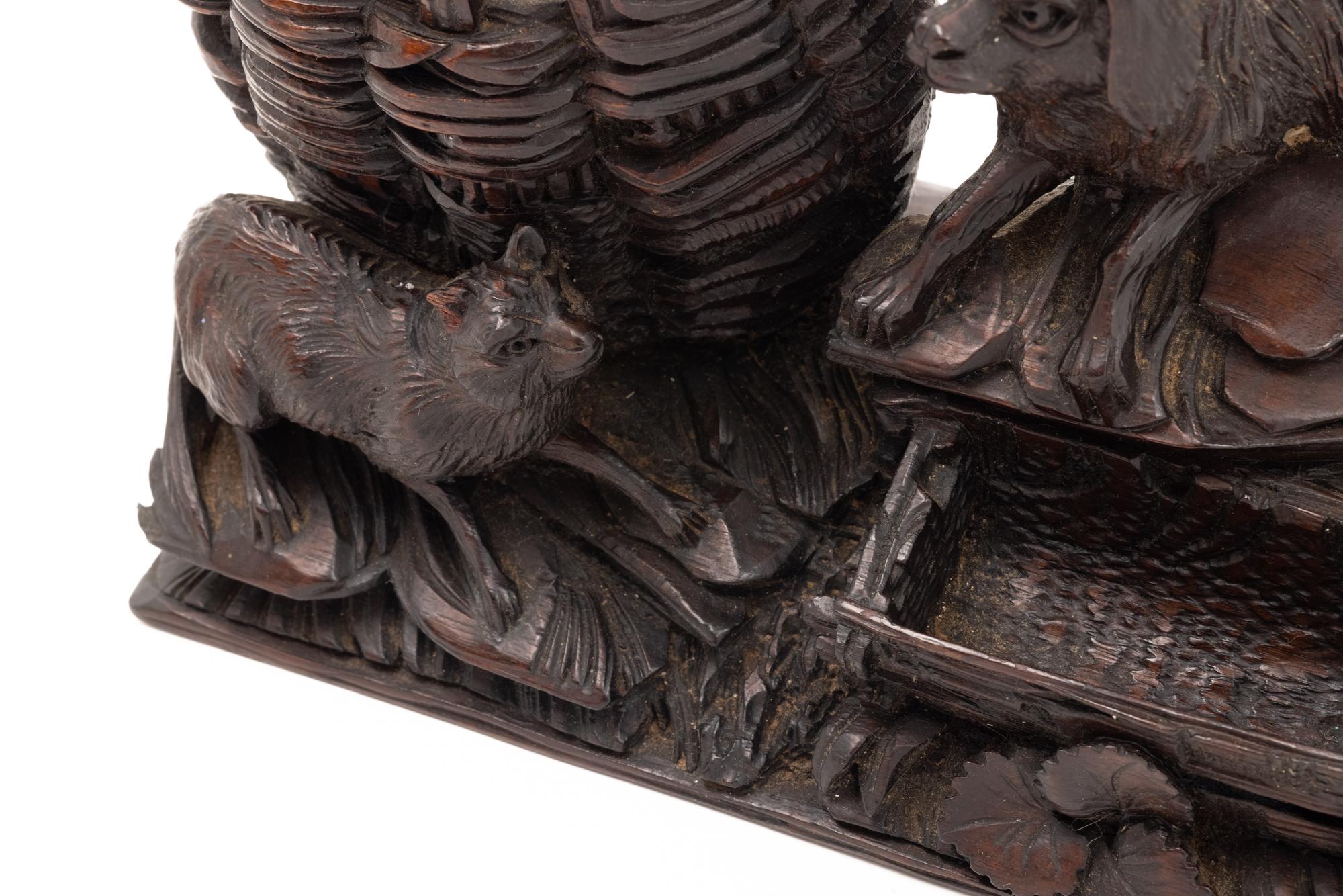 A Black Forest Carved Cigar Humidor