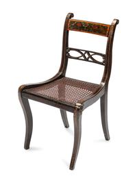 A Set of Six Regency Stencil Decorated and Parcel Gilt Ebonized Dining Chairs