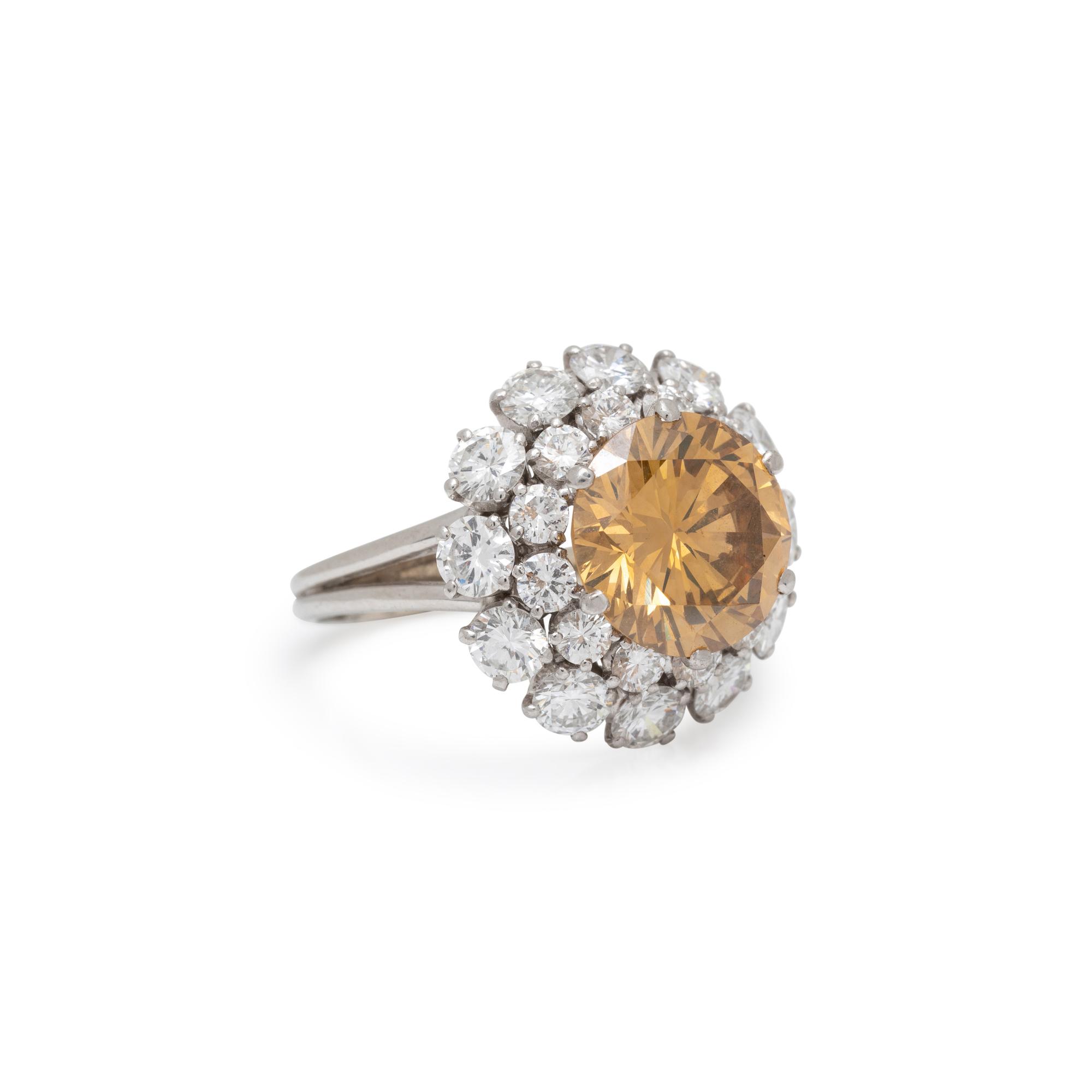 FANCY DEEP BROWNISH ORANGY YELLOW DIAMOND AND DIAMOND RING