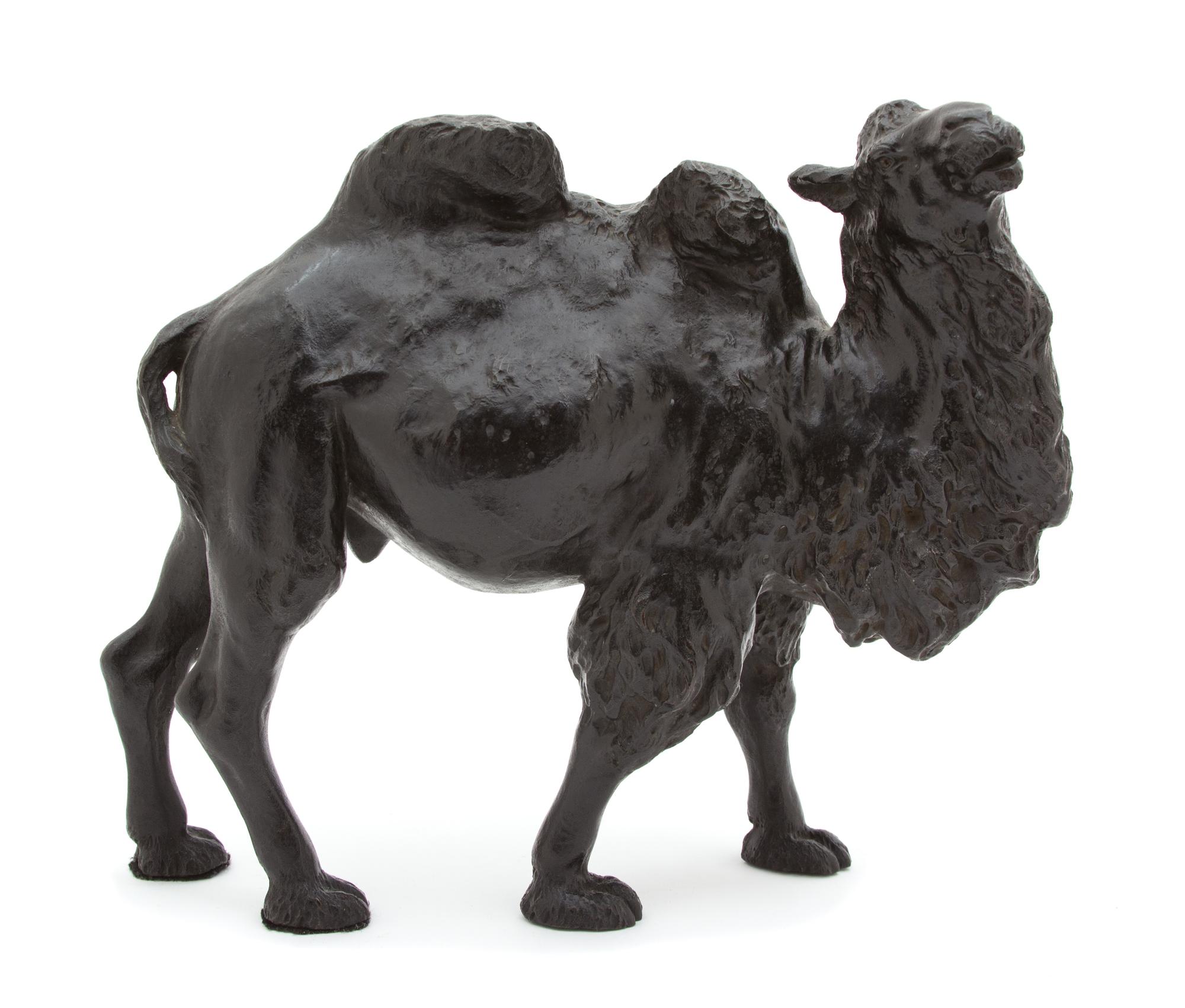 A Bronze Model of a Bactrian Camel Height 9 1/2 x length 12 1/2 inches. — 20TH CENTURY