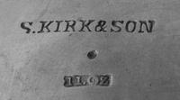 An American Coin Silver Wine Cooler, S. Kirk & Son, Baltimore, MD, the body worked to show grape clusters on a vine, each handle in the