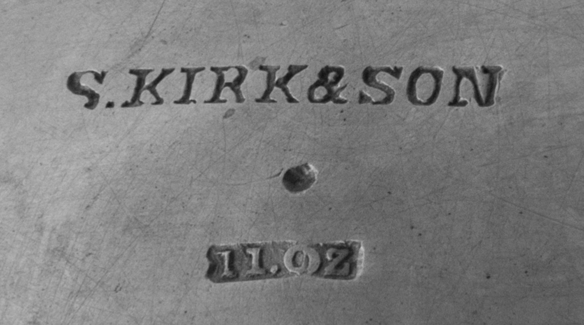 An American Coin Silver Wine Cooler, S. Kirk & Son, Baltimore, MD, the body worked to show grape clusters on a vine, each handle in the