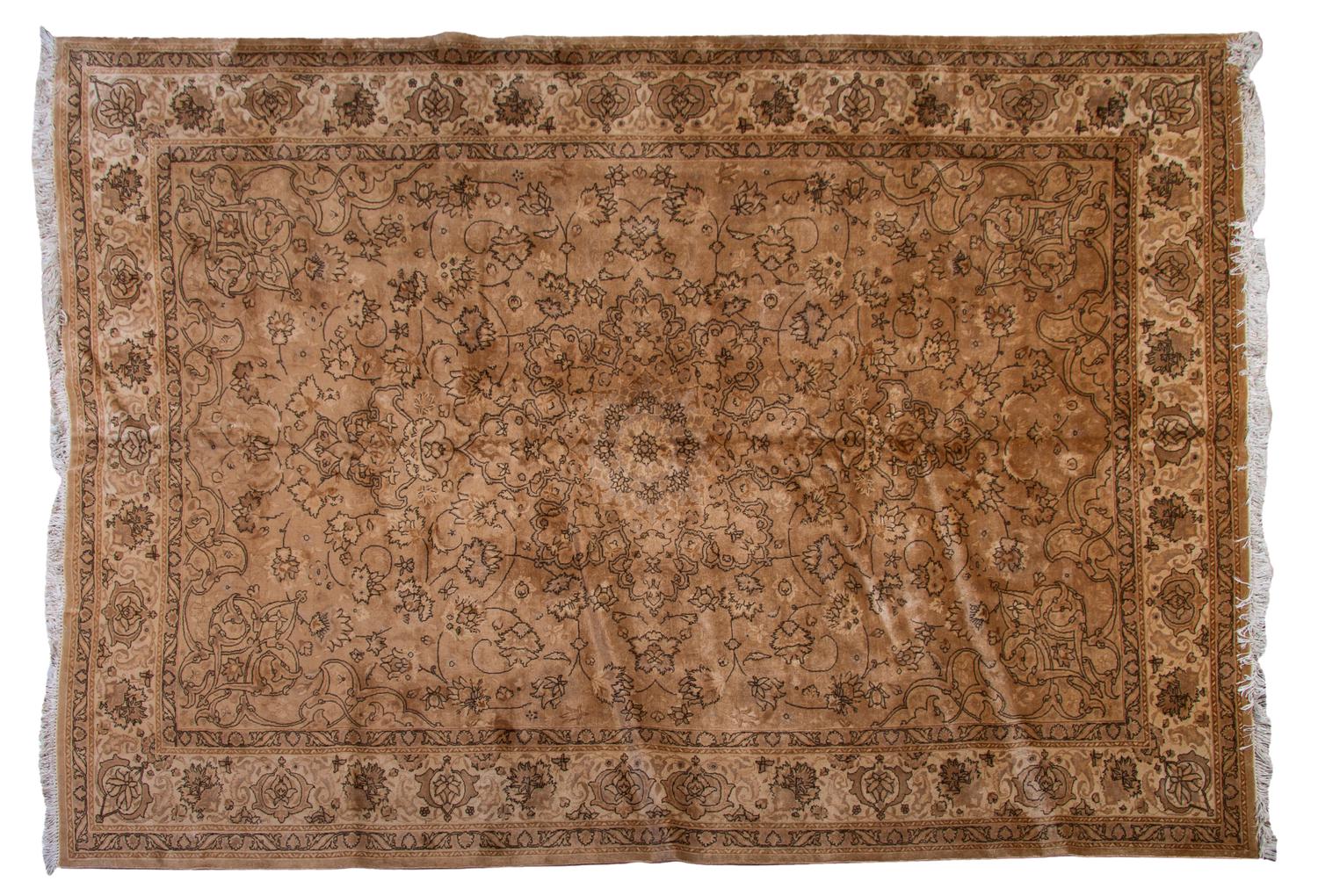 A Tabriz Wool Rug, 7 feet x 10 feet.