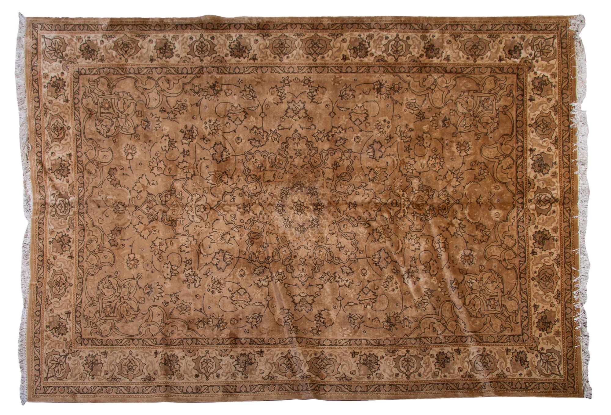 A Tabriz Wool Rug, 7 feet x 10 feet.