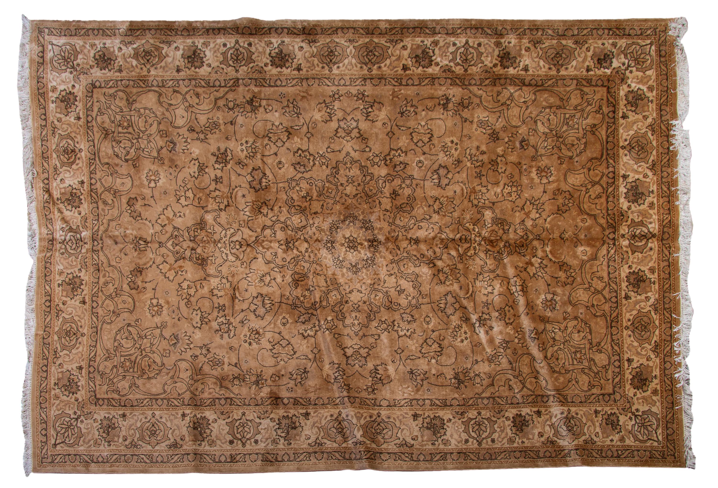 A Tabriz Wool Rug, 7 feet x 10 feet.