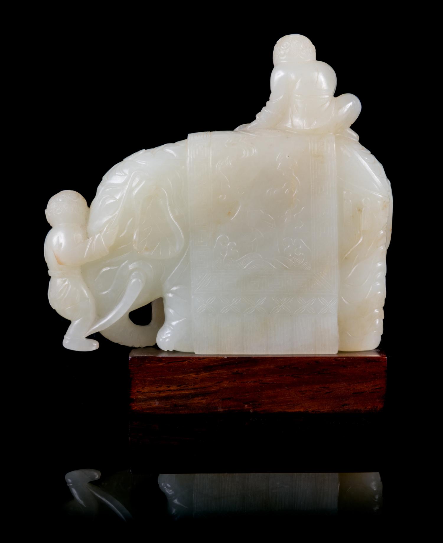 A Pale Celadon Jade Figure of an Elephant and Boys Height 3 1/2 inches. — 18TH CENTURY