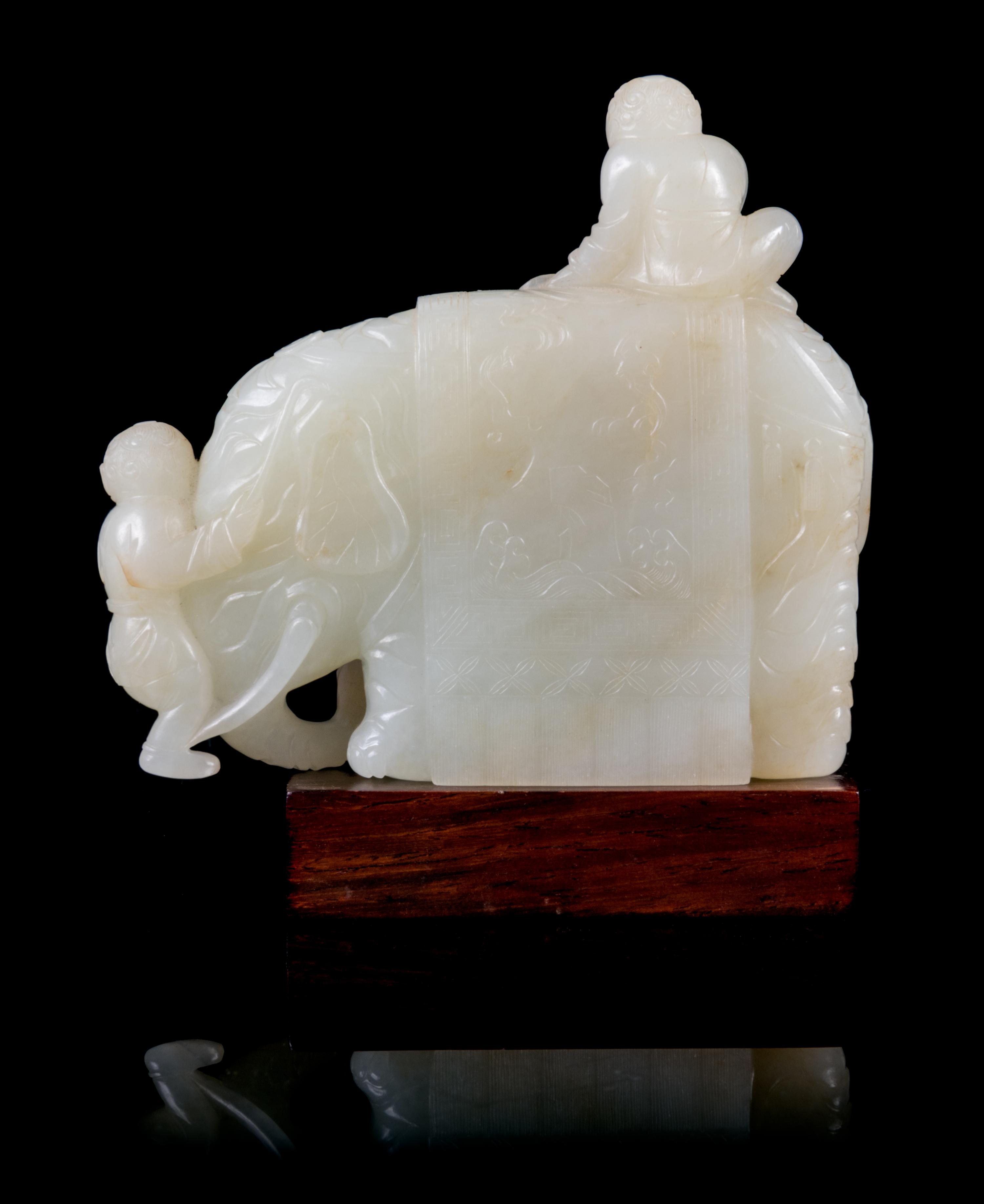 A Pale Celadon Jade Figure of an Elephant and Boys Height 3 1/2 inches. — 18TH CENTURY