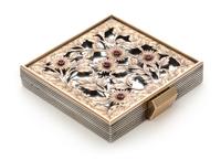 A French Silver, Rose Gold and Ruby Compact, Boucheron, Paris, 1935, the pierced and engraved cover depicting flowers and set with five