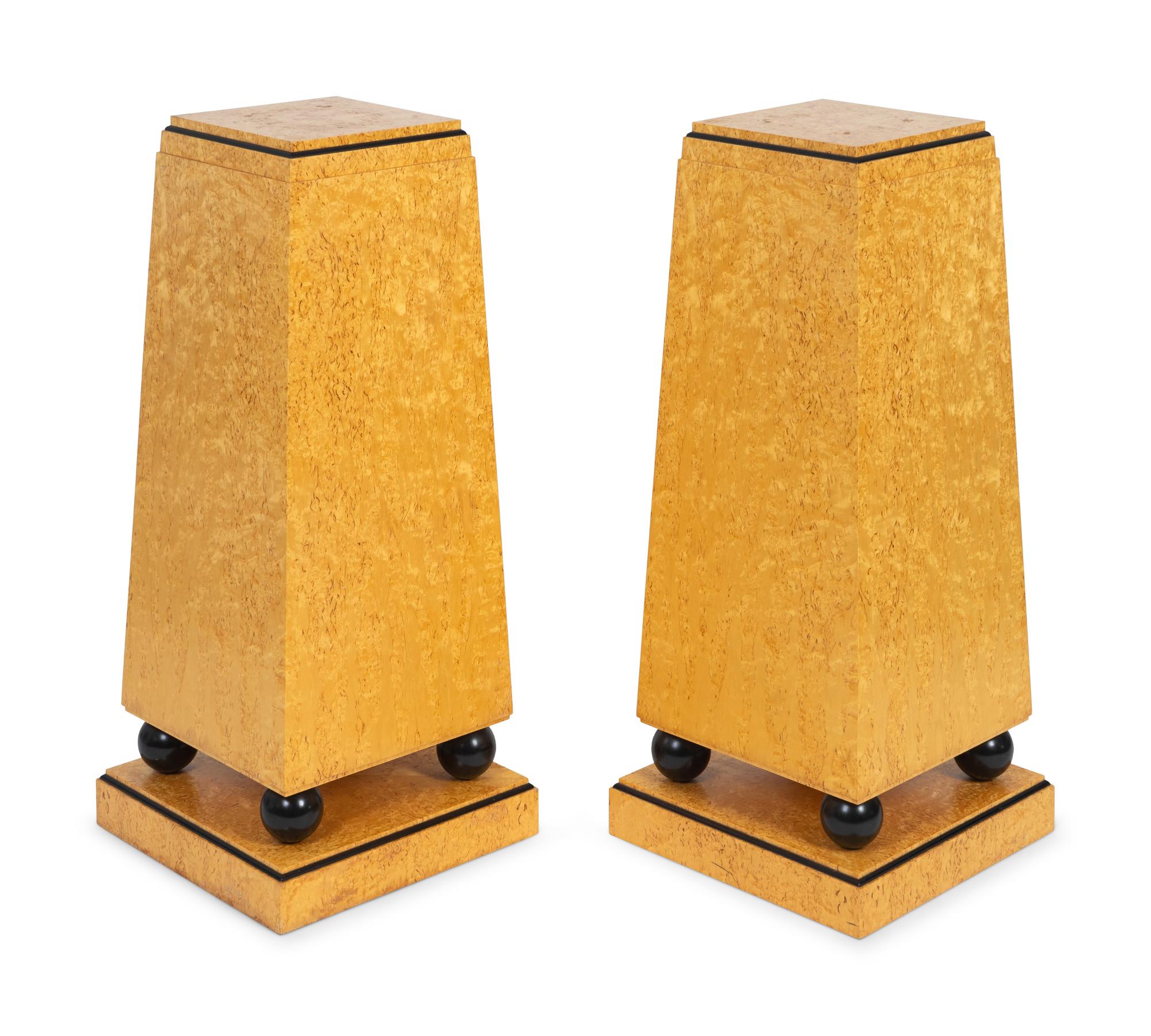 A Pair of Art Deco Style Amboyna-Veneered Pedestals — JAMES V. NEWCOMB, NO. 119A AND 119B, 2006