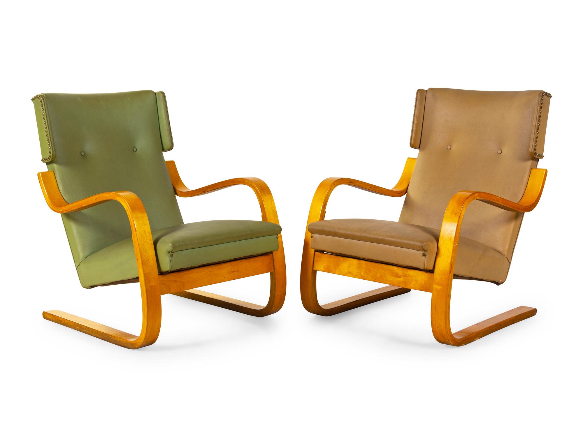 A Pair of Model 36 Lounge Chairs Finmar, Finland