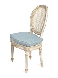 A Pair of Louis XVI Style White-Painted and Caned Chaises