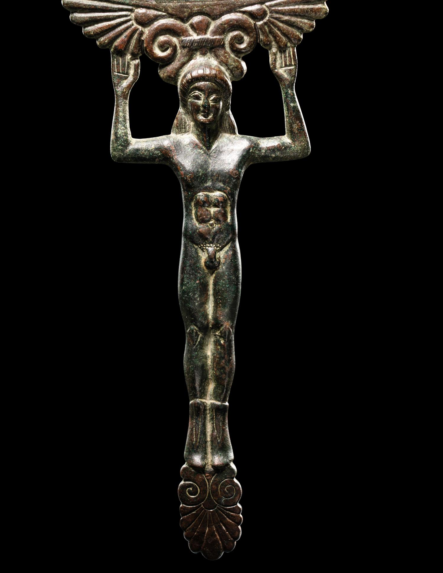 A Western Greek Bronze Patera with a Nude Youth as Handle